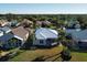 Aerial view of houses with white roofs in a community at 26159 Stillwater Cir, Punta Gorda, FL 33955