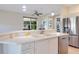 Kitchen with double sink, stainless steel appliances, and white cabinets at 2617 Cottonwood Ln, North Port, FL 34289