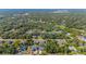 Aerial view of residential neighborhood with lush landscaping at 267 Lecturn St, Port Charlotte, FL 33954