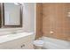 Clean bathroom with tiled shower/tub and vanity at 267 Lecturn St, Port Charlotte, FL 33954