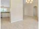 Spacious dining area with tile flooring and access to kitchen at 267 Lecturn St, Port Charlotte, FL 33954