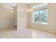 Dining area with tile floors and a view into the kitchen at 267 Lecturn St, Port Charlotte, FL 33954