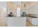 Modern kitchen with stainless steel appliances and granite countertops at 267 Lecturn St, Port Charlotte, FL 33954