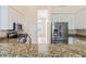Modern kitchen with stainless steel appliances and granite countertops at 267 Lecturn St, Port Charlotte, FL 33954