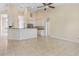 Open kitchen with stainless steel appliances and breakfast bar at 267 Lecturn St, Port Charlotte, FL 33954