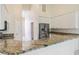 Modern kitchen with stainless steel appliances and granite countertops at 267 Lecturn St, Port Charlotte, FL 33954