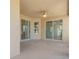 Covered porch with sliding doors leading inside at 267 Lecturn St, Port Charlotte, FL 33954