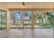 Spacious screened porch overlooking backyard at 267 Lecturn St, Port Charlotte, FL 33954