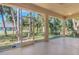 Relaxing screened porch with view of backyard at 267 Lecturn St, Port Charlotte, FL 33954