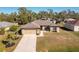 Aerial shot of the house, showcasing the property and neighborhood at 2696 Mather Ln, North Port, FL 34286