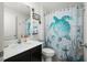 Small bathroom with a shower/tub combo, toilet and vanity at 2696 Mather Ln, North Port, FL 34286