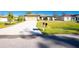 Long driveway leading to the house with a mailbox at 2696 Mather Ln, North Port, FL 34286