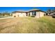 Landscaped front yard and charming curb appeal at 2696 Mather Ln, North Port, FL 34286
