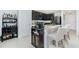 Kitchen features breakfast bar and ample cabinet space at 2696 Mather Ln, North Port, FL 34286