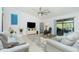Open living area featuring neutral tones and natural light at 2696 Mather Ln, North Port, FL 34286