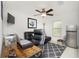 Home office with a desk, comfortable seating and mini-fridge at 2696 Mather Ln, North Port, FL 34286