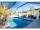 Inviting screened pool and patio area at 2696 Mather Ln, North Port, FL 34286