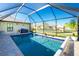 Screened-in pool with spacious deck at 2696 Mather Ln, North Port, FL 34286