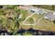 Expansive fenced yard backing onto a wooded area, providing privacy and a sense of natural beauty at 3393 Kacher Rd, North Port, FL 34288