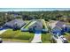 Aerial view showcasing a house and surrounding homes at 3393 Kacher Rd, North Port, FL 34288