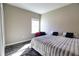 Bedroom with a large window and closet at 3393 Kacher Rd, North Port, FL 34288