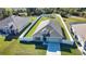 Charming home featuring a well-manicured lawn and a privacy fence, perfect for outdoor enjoyment at 3393 Kacher Rd, North Port, FL 34288