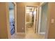 Hallway with views to the bathroom and bedrooms at 3393 Kacher Rd, North Port, FL 34288