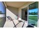 Covered lanai with access to the home's interior and outdoor space, perfect for relaxing at 3393 Kacher Rd, North Port, FL 34288