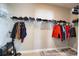 Walk-in closet features wire shelving and a hanging rod for optimal storage at 3393 Kacher Rd, North Port, FL 34288