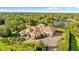 Large estate home with extensive landscaping and lake views at 3409 Carpel St, Plant City, FL 33566