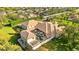 Large home with pool and surrounding lush landscape at 3409 Carpel St, Plant City, FL 33566
