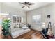 Cozy bedroom with hardwood floors and daybed at 3409 Carpel St, Plant City, FL 33566