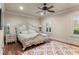 Elegant bedroom with ornate bed and hardwood floors at 3409 Carpel St, Plant City, FL 33566