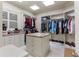 Custom walk-in closet with ample shelving and drawers at 3409 Carpel St, Plant City, FL 33566