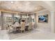Formal dining room with ornate furniture and large artwork at 3409 Carpel St, Plant City, FL 33566
