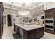 Open kitchen with large island and stainless steel appliances at 3409 Carpel St, Plant City, FL 33566