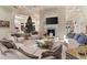 Bright and airy living room with comfortable seating areas centered around a coffee table at 3409 Carpel St, Plant City, FL 33566