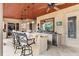 Summer kitchen with bar seating and appliances at 3409 Carpel St, Plant City, FL 33566