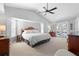 Large main bedroom with a king-size bed and access to the pool at 430 Monaco Dr, Punta Gorda, FL 33950