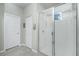 Shower with glass enclosure and linen closet at 43930 Cattleman Dr, Punta Gorda, FL 33982