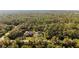 Two houses surrounded by lush greenery, seen from above at 14059 Gailwood Ave, Port Charlotte, FL 33953