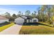 New construction home with a large yard and paver driveway at 14059 Gailwood Ave, Port Charlotte, FL 33953
