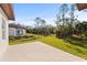 Large backyard with grassy area and patio at 14059 Gailwood Ave, Port Charlotte, FL 33953