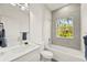 Clean bathroom with white vanity and bathtub at 14059 Gailwood Ave, Port Charlotte, FL 33953