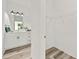 Bathroom with white cabinets and walk-in closet at 14059 Gailwood Ave, Port Charlotte, FL 33953