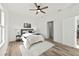 Bright bedroom with ceiling fan and access to bathroom at 14059 Gailwood Ave, Port Charlotte, FL 33953