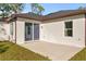 Back exterior view showing sliding glass door to home at 14059 Gailwood Ave, Port Charlotte, FL 33953