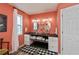 Bathroom with double sinks and a checkered rug at 19983 Midway Blvd, Port Charlotte, FL 33948