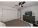 Bedroom with large closet, TV, and neutral walls at 19983 Midway Blvd, Port Charlotte, FL 33948