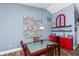 Dining room with custom built-in bar area at 19983 Midway Blvd, Port Charlotte, FL 33948